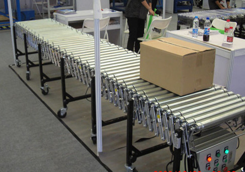 伸縮輥筒輸送機(jī)運(yùn)行圖,m.hmgs.net.cn